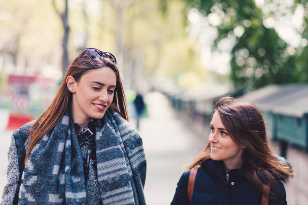 istock Girls in Paris walking and talking 879828784