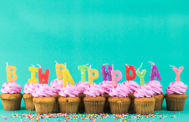 istock pink cup cake with happy birthday candle 879834046