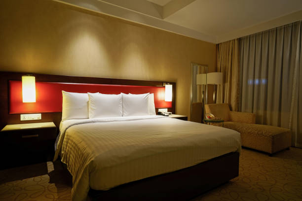 istock Elegant and comfortable bedroom interior 879878530