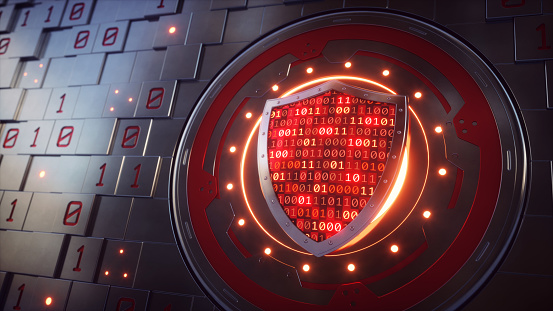 An artificial wall consisting of plain square bricks with a mechanical opening that is guarded by a shield. The shield contains glowing red binary numbers.

