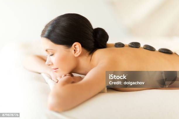 Woman In Spa With Hot Stones Stock Photo - Download Image Now - Lastone Therapy, One Woman Only, Spa