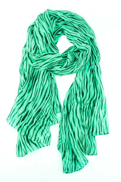 istock Green silk scarf isolated on white background. 879879306