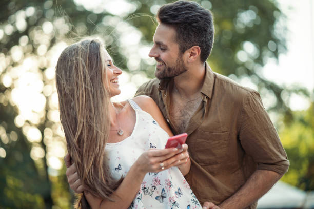 istock Nice happy couple meeting in the park 879894608