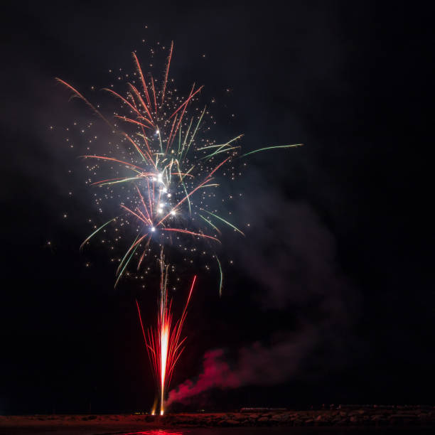 Fireworks on sea stock photo