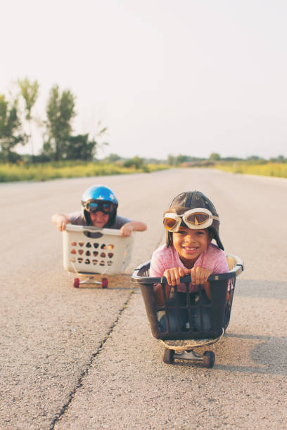 istock Young Boy Racing Racers 879913416