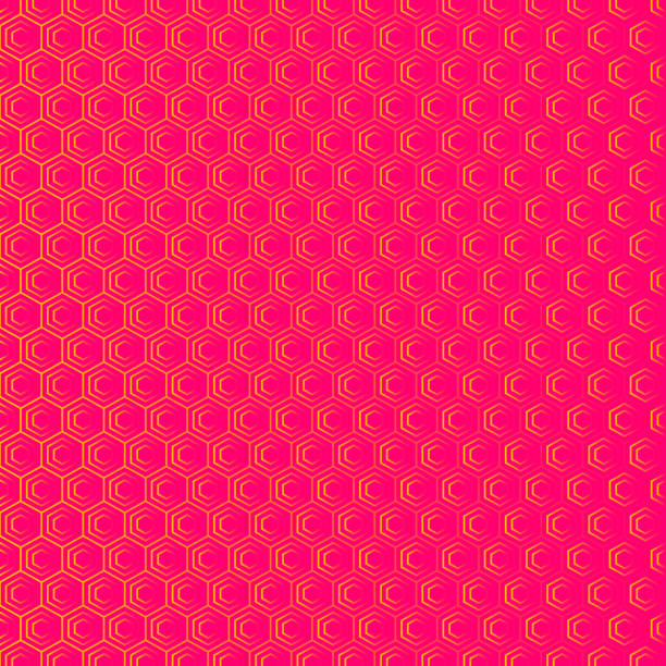 istock An abstract geometric background or pattern that is made up of hexagons of different sizes. Modern texture in pink and orange 879913458