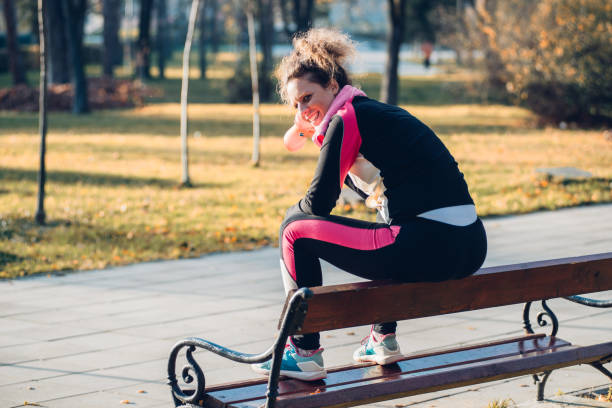 istock Woman training and jogging in the park 879917816