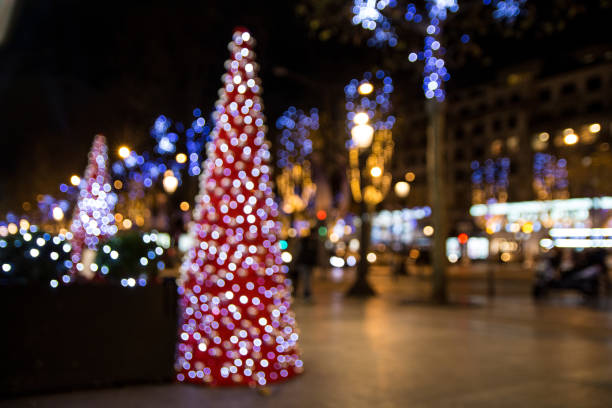 istock Defocused Christmas trees in Paris at night 879934150
