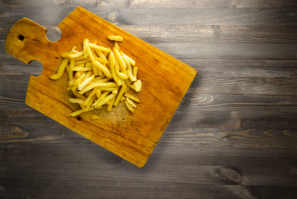 istock fry potatoes on a wooden background 879943834