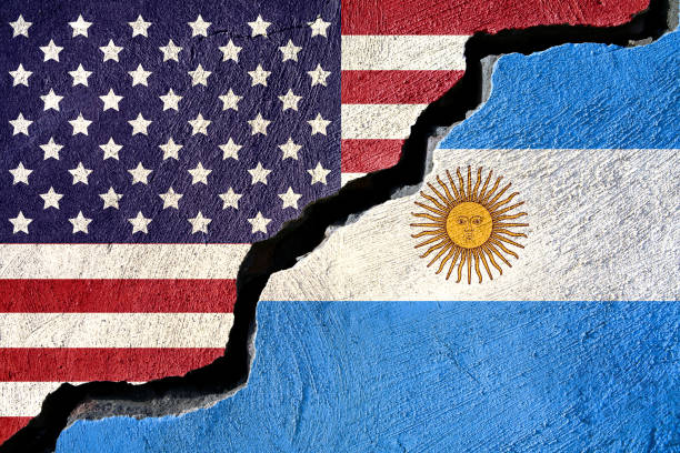 istock Concept american and Argentina flag on cracked background 879949708
