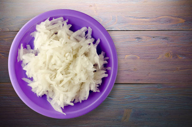 istock daikon on a wooden background 879949808