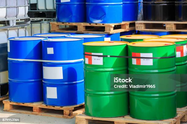 Big Green And Blue Barrels On Wooden Pallets Stock Photo - Download Image Now - Garbage, Cooking Oil, Drum - Percussion Instrument