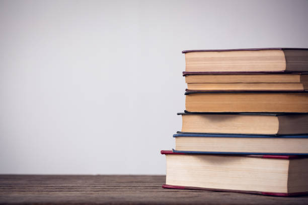 istock Close up of books on table 879961894