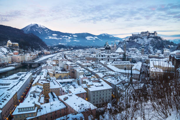 Panorama Salzburg during sunset with view on fortress in winter, Austria Panorama Salzburg during sunset with view on fortress in winter with fresh snow, Austria Kapuzinerberg stock pictures, royalty-free photos & images