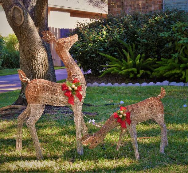 Reindeer Statues on a Lawn stock photo