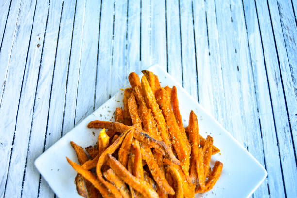 istock Sweet Potato Fries on White Table 879965304