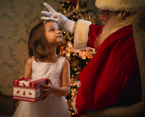 istock Santa Claus gives presents 880002146