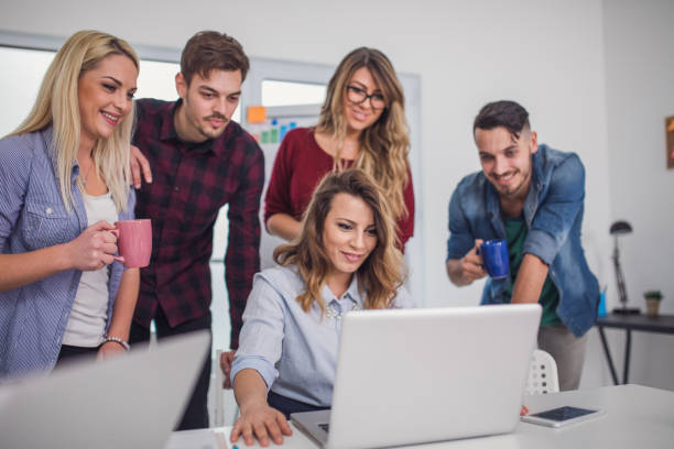 istock Young business people having a meeting 880019032