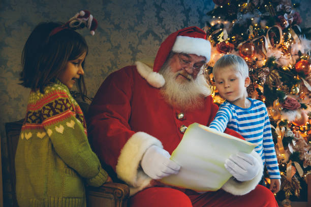 istock Santa reading fairy tales 880023160
