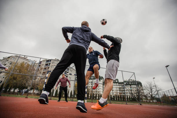 istock Friends Playing Urban Soccer 880023390