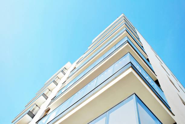 istock Modern apartment buildings on a sunny day with a blue sky. 880025746