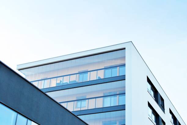 istock Modern apartment buildings on a sunny day with a blue sky. 880030644