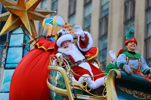 Santa Claus waves to the crowds from the Macys Santa's Sleigh float in the 91st Macys Thanksgiving Day Parade in New York, Nov. 23, 2017. (Photo: Gordon Donovan)