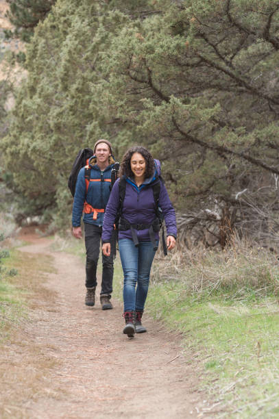 istock Good friends out on a backpacking adventure together 880057588