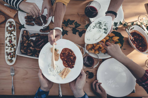 istock Family having meat together 880066782