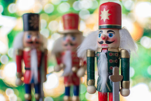 istock Christmas nutcracker toy soldier traditional figurine with bokeh background 880116544