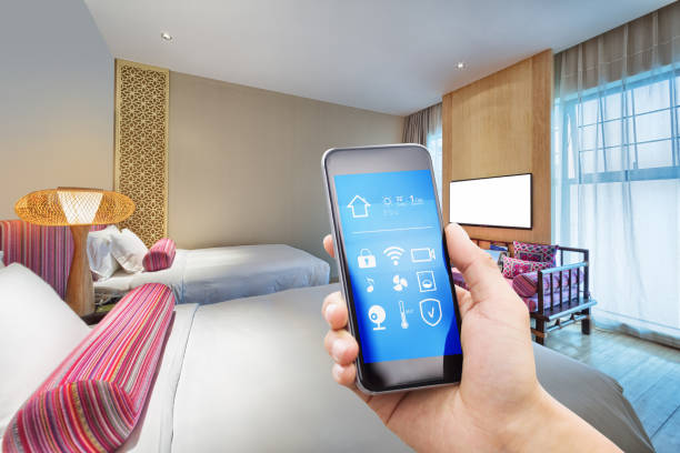 istock smart phone with smart home with modern bedroom 880119244
