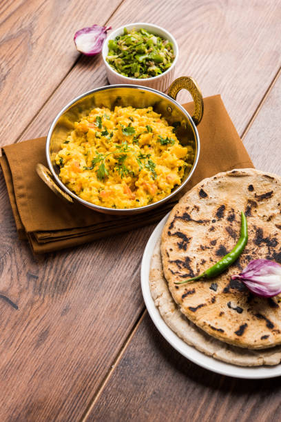 istock Pithla or Pithla Bhakar, popular recipe from Maharashtra 880131434