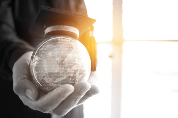 istock Education in Global, Graduation cap on Businessman holding Earth globe model map with Radar background in hands. Concept of global business, abroad educational, Back to School. 880133982