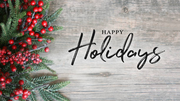 Happy Holidays Text with Holiday Evergreen Branches and Berries Over Rustic Wooden Background Happy Holidays Text with Holiday Evergreen Branches and Berries in Corner Over Rustic Wooden Background pinaceae stock pictures, royalty-free photos & images