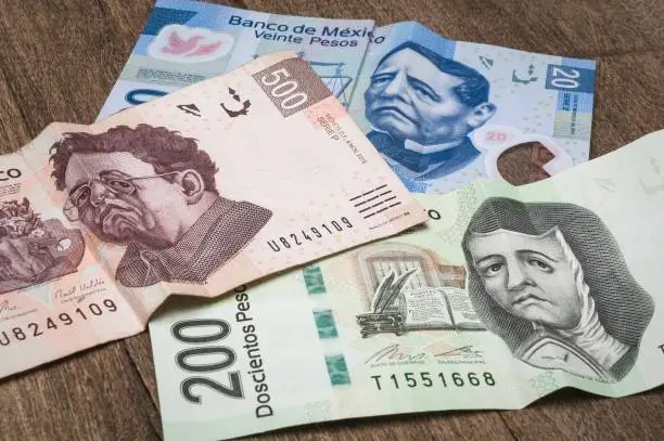 Some bills of 20, 200 and 500 mexican pesos seems to be sad.
