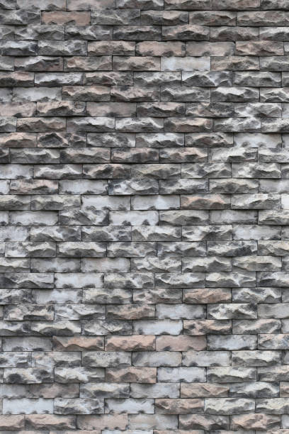 istock Texture of old weathered brick wall decayed and broken malfunctioning degraded for design background. 880154766