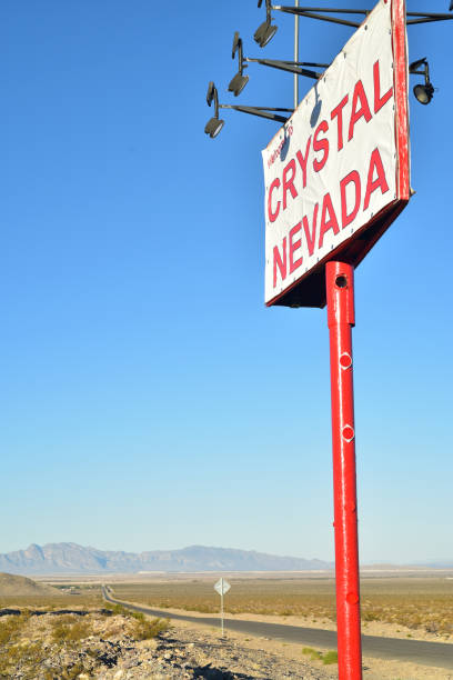 istock sign for tiny remote town Crystal Nevada in desert landscape 880157488
