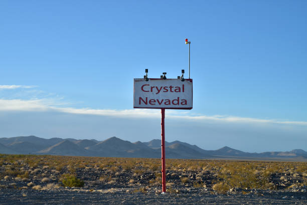 istock sign for tiny remote town Crystal Nevada in desert landscape 880157494