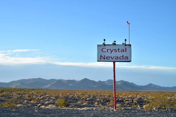 istock sign for tiny remote town Crystal Nevada in desert landscape 880157516