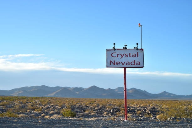 istock sign for tiny remote town Crystal Nevada in desert landscape 880157534