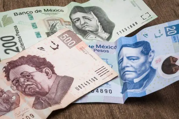Some bills of 20, 200 and 500 mexican pesos seem sad.