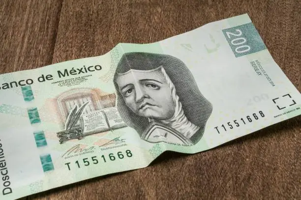 A 200 mexican pesos bill seems to be sad.