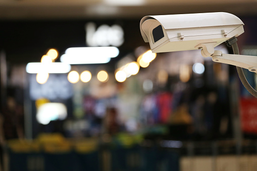 CCTV Camera Record on blur background of  interior restaurant, concept of security and safety.