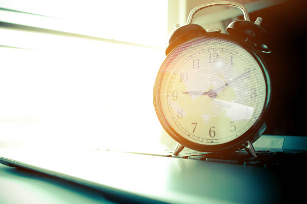 istock Alarm clock with Radar background on computer. Concept of abroad international Educational, times Studies lead to success in life, Time is  Education. 880182796
