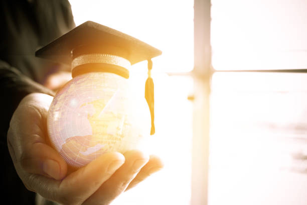istock Education in Global, Graduation cap on Businessman holding Earth globe model map with Radar background in hands. Concept of global business, abroad educational, Back to School. 880184920