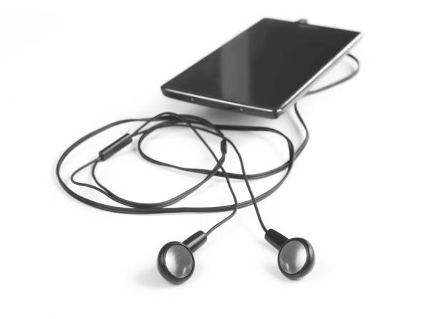 istock earphones and smartphone isolated 880190286