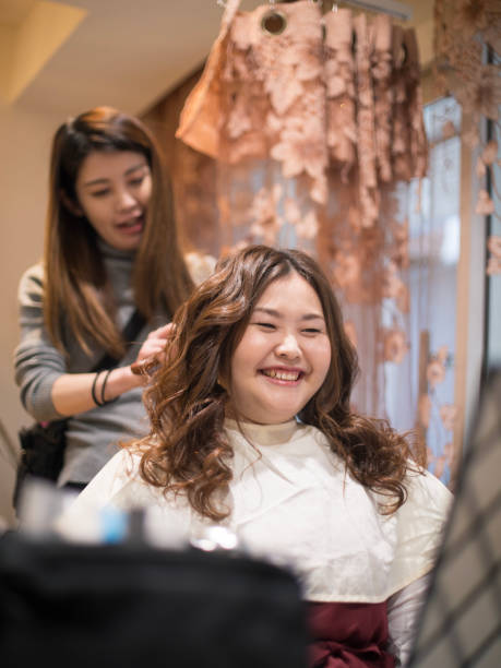 istock Happy time for hair cut in salon 880195186