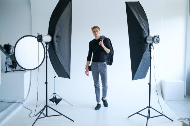 backstage man workplace photo studio concept backstage self-confident man equipment workplace photo studio concept. Photography of fashion look. stage set photos stock pictures, royalty-free photos & images