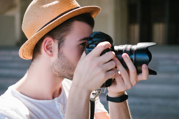 istock professional photographer lifestyle camera art 880200718