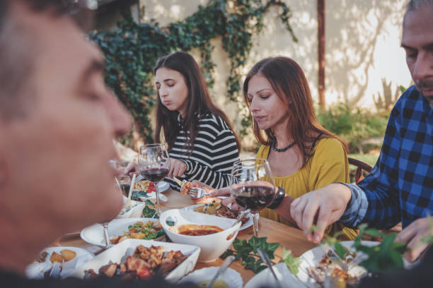 istock Family dining outdoor 880200904